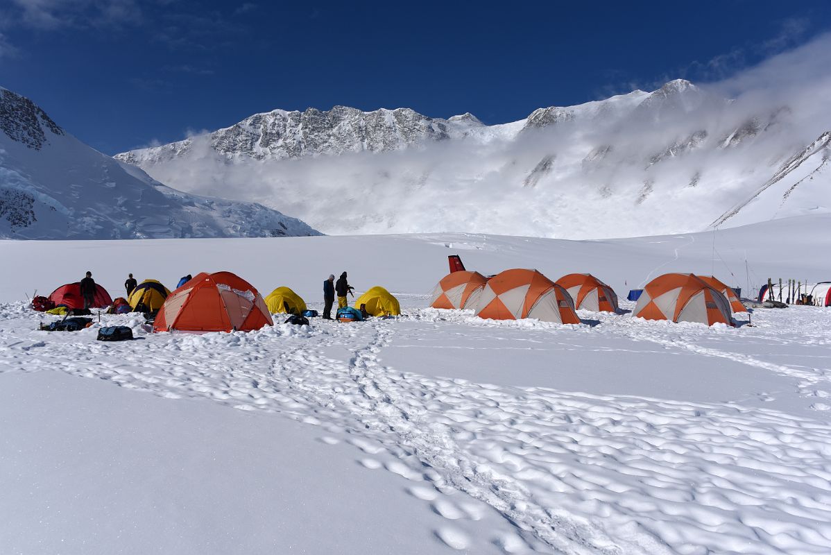 02C Mount Vinson Base Camp Tents On The Branscomb Glacier With Branscomb Peak, Mount Vinson, Silverstein Peak, Principe de Asturias Peak Above